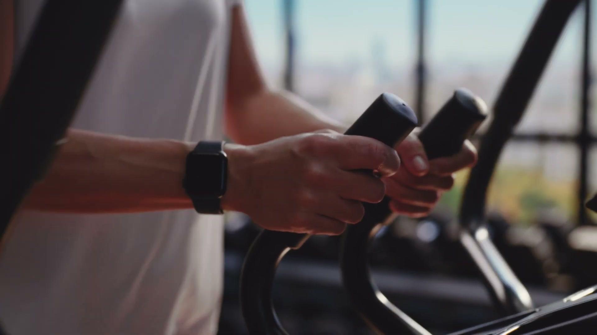 Life Fitness Atmos elliptical product detail in the LED-lit gym scene
