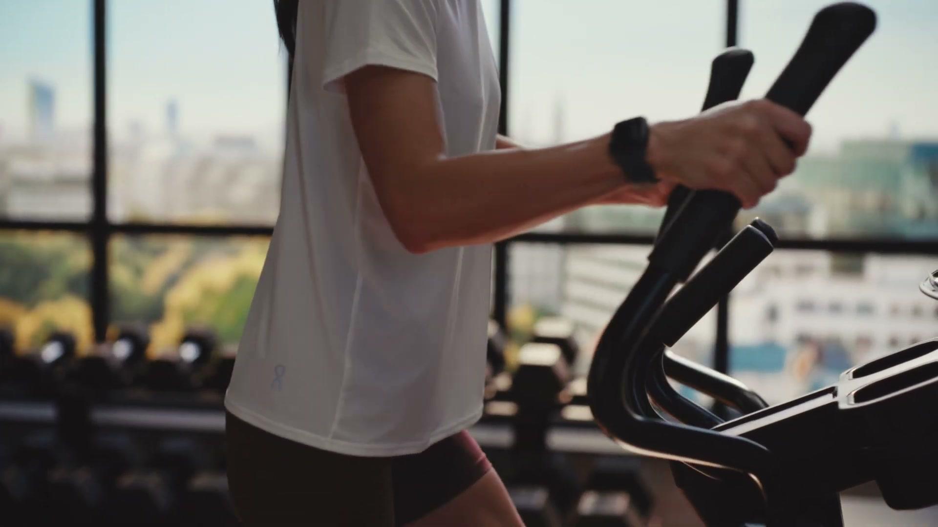 Life Fitness Atmos elliptical wide composition with the LED volume window backplate