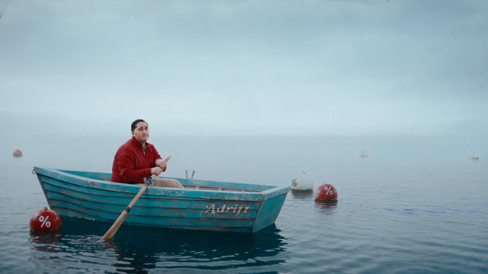 Raisin boat film, Michael adrift in a rowing boat on a foggy sea among percentage buoys, Tungsten Media