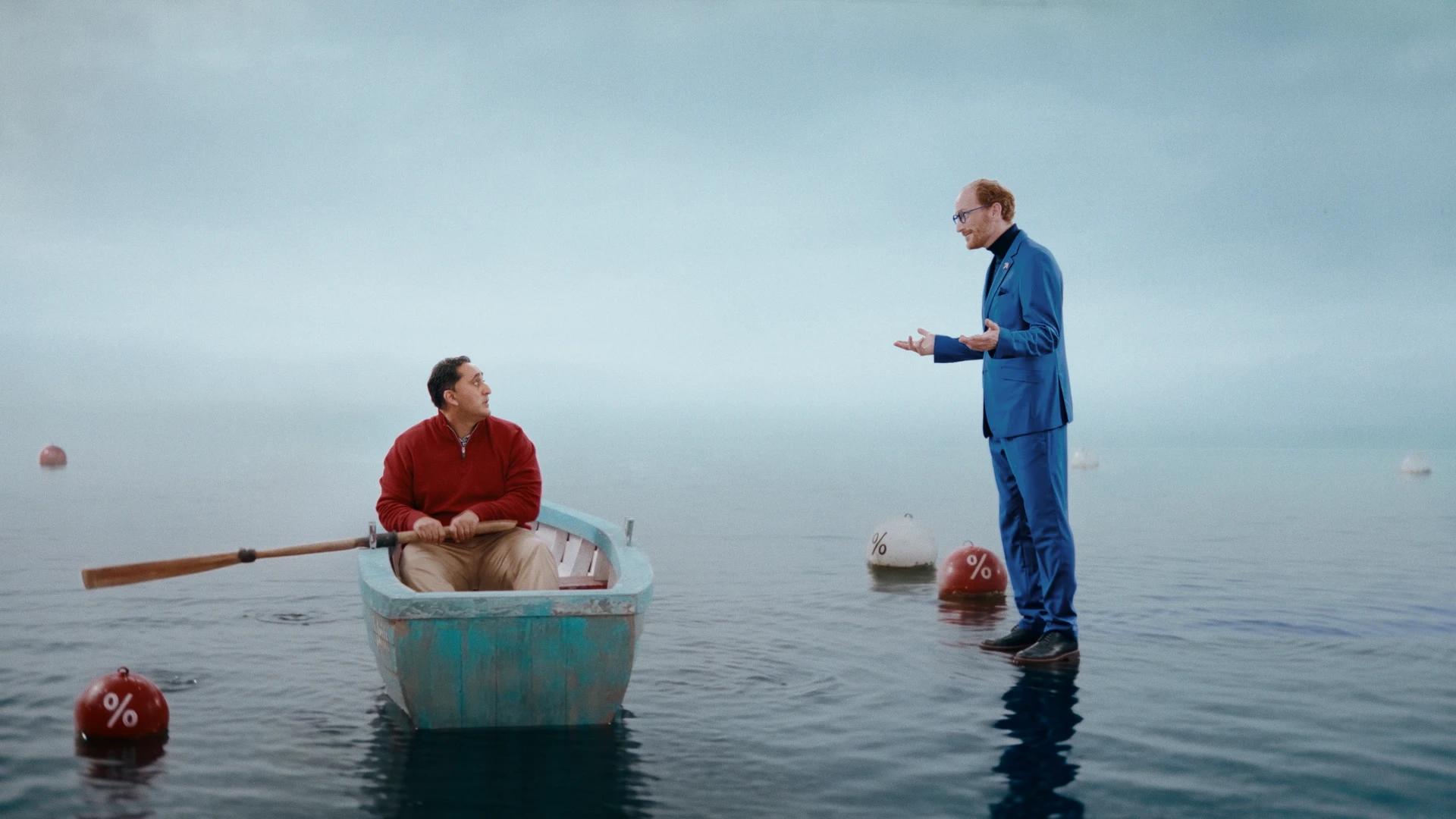 Raisin boat film, the Voice of Reason standing on the water beside Michael in the boat, Tungsten Media