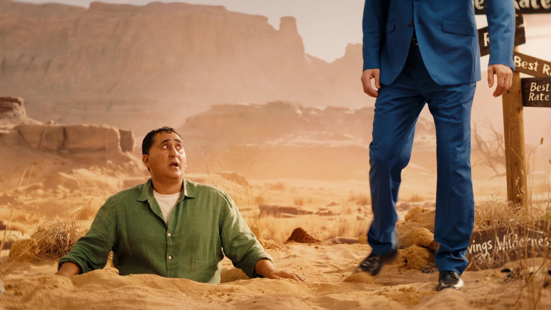 Raisin desert, the Voice of Reason standing over Michael buried in the sand, Tungsten Media