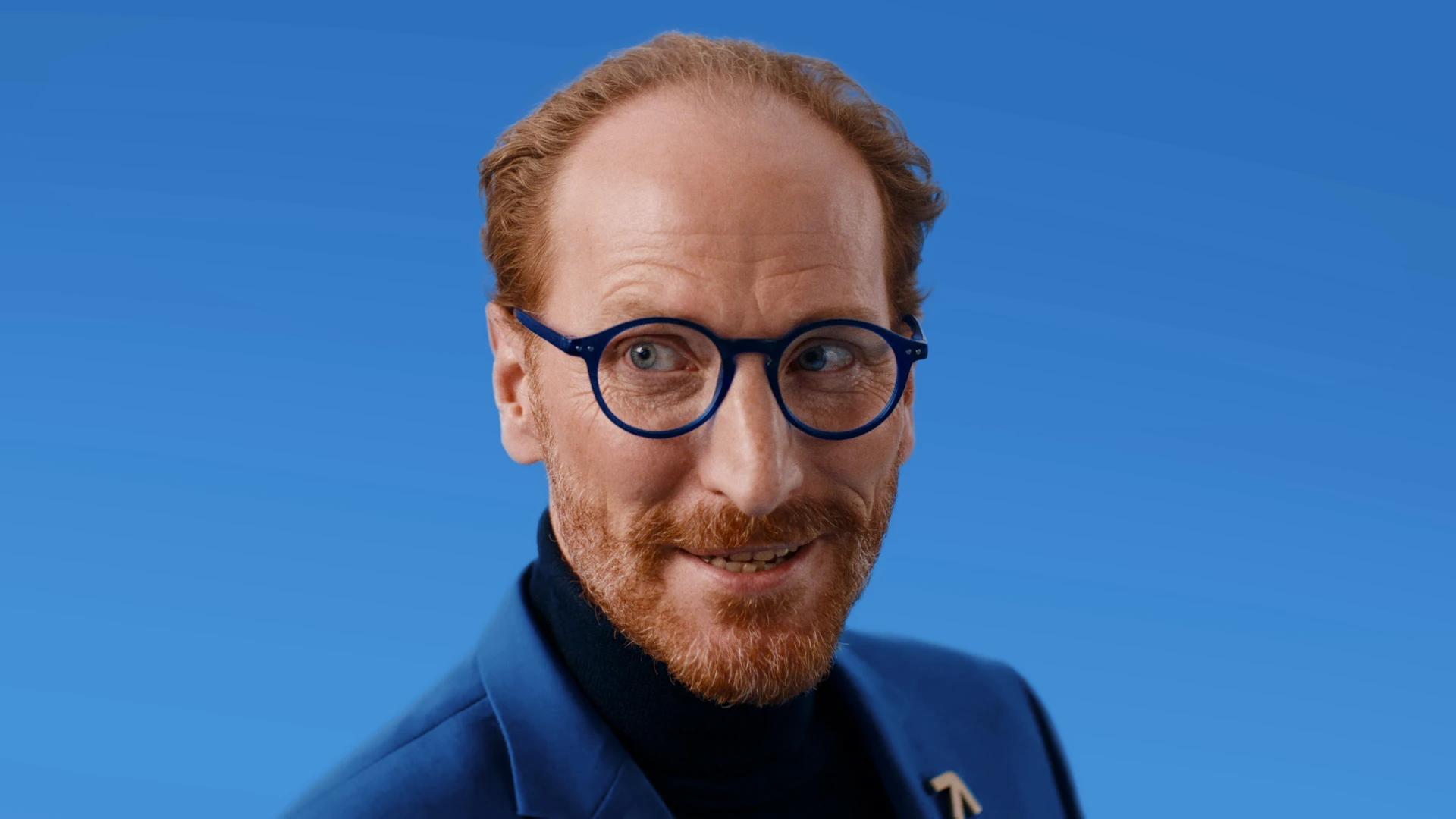 Raisin, the Voice of Reason smiling in the Raisin blue world, Tungsten Media