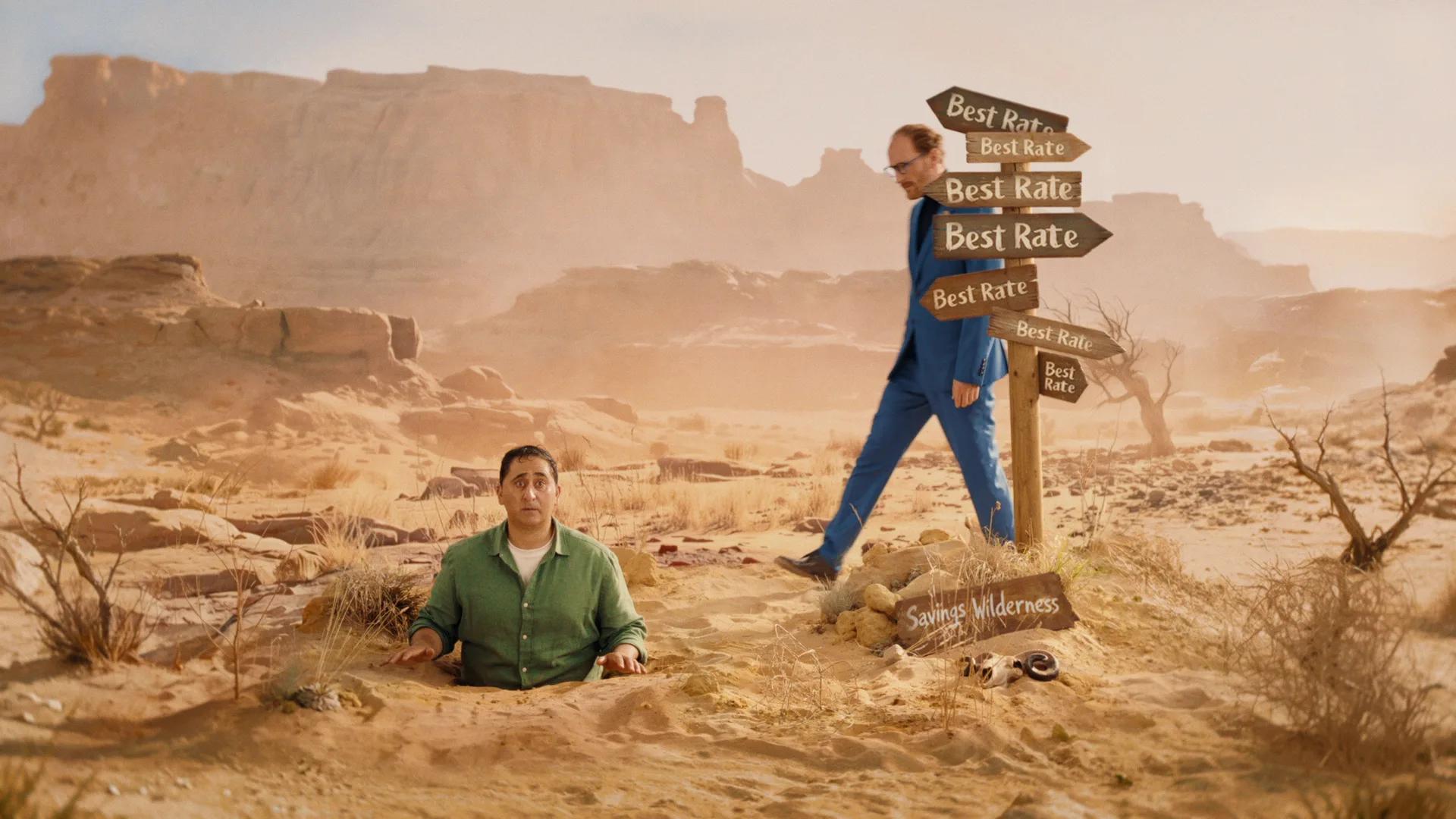 Raisin desert, the Voice of Reason steps out from behind the Best Rate signpost towards Michael, Tungsten Media